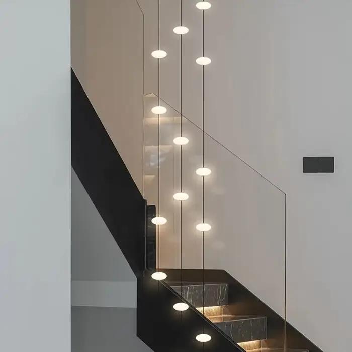 Art moderne Villa cage d'escalier creux LED lustre minimaliste noir rond escalier lampes suspendues intérieur maison longs luminaires